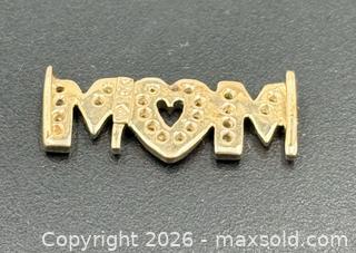 MaxSold Auction: 10K Gold Diamond "MOM" Heart Slide Pendant - Esquimalt (British Columbia, Canada) PARTNER MANAGED Reseller Online Auction - Lampson Street