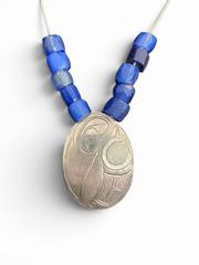 MaxSold Auction: First Nations Sterling Silver Pendant by Norman Seaweed with 10 Cobalt Blue Trade Beads - 18" Length, 17.14g - Esquimalt (British Columbia, Canada) PARTNER MANAGED Reseller Online Auction - Lampson Street