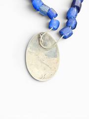 MaxSold Auction: First Nations Sterling Silver Pendant by Norman Seaweed with 10 Cobalt Blue Trade Beads - 18" Length, 17.14g - Esquimalt (British Columbia, Canada) PARTNER MANAGED Reseller Online Auction - Lampson Street