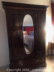 MaxSold Auction: Antique French Provincial Solid Wood Armoire with Oval Mirror - Yonkers (New York, USA) SELLER MANAGED Downsizing Online Auction - Riverdale Avenue (STORAGE)