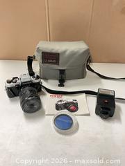 MaxSold Auction: Pentax program plus 35mm film camera with Le Mans Case - lot 1186 - East Cocalico Township (Pennsylvania, USA) PARTNER MANAGED Estate Sale Online Auction - West Church Street