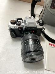 MaxSold Auction: Pentax program plus 35mm film camera with Le Mans Case - lot 1186 - East Cocalico Township (Pennsylvania, USA) PARTNER MANAGED Estate Sale Online Auction - West Church Street