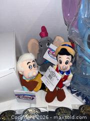 MaxSold Auction: Disney Lot: Plush, Sealed Pins, Ceramic Stitch Bank & Village - Doylestown Township (Pennsylvania, USA) PARTNER MANAGED Downsizing Online Auction - Country Brook Drive
