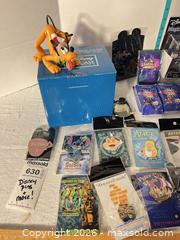 MaxSold Auction: Lot of 11–30 Disney & Tomy Collectible Pins, Figurines, Display B - Doylestown Township (Pennsylvania, USA) PARTNER MANAGED Downsizing Online Auction - Country Brook Drive