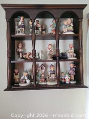 MaxSold Auction: Hummel (Goebel) Porcelain Figurines Lot with Wooden Display Shelf - High Bridge (New Jersey, USA) PARTNER MANAGED Estate Sale Online Auction -  West Main Street