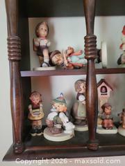 MaxSold Auction: Hummel (Goebel) Porcelain Figurines Lot with Wooden Display Shelf - High Bridge (New Jersey, USA) PARTNER MANAGED Estate Sale Online Auction -  West Main Street