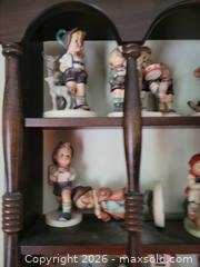 MaxSold Auction: Hummel (Goebel) Porcelain Figurines Lot with Wooden Display Shelf - High Bridge (New Jersey, USA) PARTNER MANAGED Estate Sale Online Auction -  West Main Street