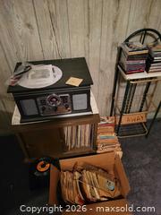 MaxSold Auction: Record Player Console with Stereo Radio, LPs, 45s & CDs - High Bridge (New Jersey, USA) PARTNER MANAGED Estate Sale Online Auction -  West Main Street