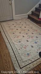 MaxSold Auction: Ivory Floral Bordered Wool Area Rug, 6' x 9' - Toronto (Ontario, Canada) PARTNER MANAGED Estate Sale Online Auction -  Saint Andrews Gardens