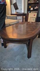 MaxSold Auction: Traditional Dark Brown Veneer Over Wood Coffee Table, 48" x 26" - Toronto (Ontario, Canada) PARTNER MANAGED Estate Sale Online Auction -  Saint Andrews Gardens