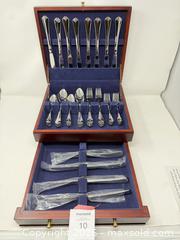 MaxSold Auction: Lagostina 60-Piece Stainless Steel Flatware Set - Stratford (Ontario, Canada) PARTNER MANAGED Estate Sale Online Auction - Cawston Street (CONDO)