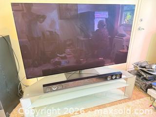 MaxSold Auction: LG 55" Flat-screen TV with LG Soundbar and Glass TV Stand - Stratford (Ontario, Canada) PARTNER MANAGED Estate Sale Online Auction - Cawston Street (CONDO)