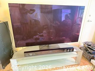 MaxSold Auction: LG 55" Flat-screen TV with LG Soundbar and Glass TV Stand - Stratford (Ontario, Canada) PARTNER MANAGED Estate Sale Online Auction - Cawston Street (CONDO)