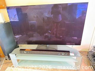 MaxSold Auction: LG 55" Flat-screen TV with LG Soundbar and Glass TV Stand - Stratford (Ontario, Canada) PARTNER MANAGED Estate Sale Online Auction - Cawston Street (CONDO)