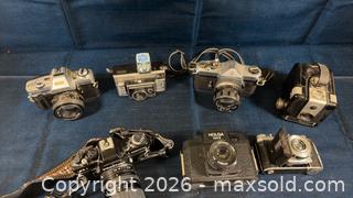 MaxSold Auction: Lot of Vintage Film Cameras: Praktica, Holga & Others - Beckwith (Ontario, Canada) SELLER MANAGED Downsizing Online Auction -  6th Line Beckwith