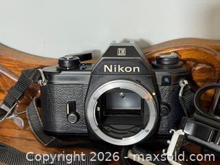 MaxSold Auction: Nikon EM 35mm SLR Film Camera Body + other Camera Accessories - Fort Erie (Ontario, Canada) SELLER MANAGED Estate Sale Online Auction - Caribou Trail Ridgway