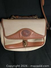 MaxSold Auction: Dooney and Burke handbag - Jacksonville (Florida, USA) SELLER MANAGED Downsizing Online Auction - Spanish Marsh Court