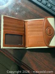 MaxSold Auction: Dooney and Burke handbag - Jacksonville (Florida, USA) SELLER MANAGED Downsizing Online Auction - Spanish Marsh Court