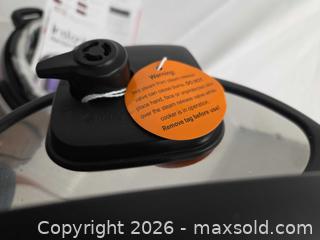 MaxSold Auction: Instant Pot Viva 6-Quart Electric Pressure Cooker - Metallic Red - Toronto (Ontario, Canada) PARTNER MANAGED Downsizing Online Auction - Dupont Street (STORAGE)