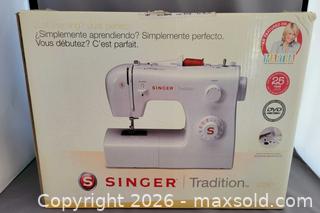 MaxSold Auction: Singer Tradition 2250 Sewing Machine, White with Red Accents - Saanich (British Columbia, Canada) SELLER MANAGED Downsizing Online Auction - Carey Rd.