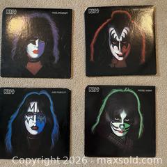 MaxSold Auction: KISS 12-inch LP Jacket Set — 4 Solo Member Album Covers - Jackson Township (New Jersey, USA) SELLER MANAGED Downsizing Online Auction - Ambassador Way