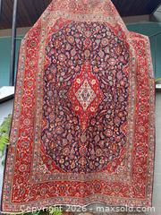 MaxSold Auction: Persian Hand-Knotted Wool Area Rug — Red, Navy & Ivory - Esquimalt (British Columbia, Canada) SELLER MANAGED Reseller Online Auction - Carlton Terrace