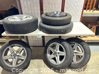 MaxSold Auction: 15 inch Alloy Wheels with Tires, 5-Lug, Volvo Center Caps - Warwick (Rhode Island, USA) SELLER MANAGED Reseller Online Auction - Warwick Avenue