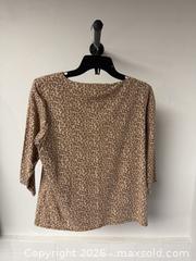 MaxSold Auction: Leopard woman size M - Vancouver (British Columbia, Canada) PARTNER MANAGED Downsizing Online Auction - Venables Street