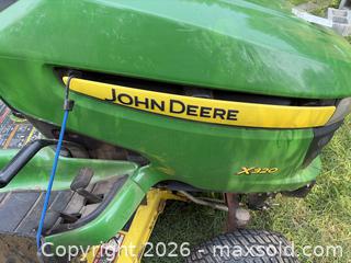 MaxSold Auction: John Deere X320 Riding Lawn Mower 48-inch Deck - Branchburg (New Jersey, USA) PARTNER MANAGED Downsizing Online Auction - Rolling Hills Lane