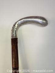 MaxSold Auction: Wood Shaft Walking Cane with Silver Curved Handle, ~36 in - Leeds And The Thousand Islands (Ontario, Canada) SELLER MANAGED Downsizing Online Auction - Thousand Islands Parkway