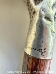MaxSold Auction: Wood Shaft Walking Cane with Silver Curved Handle, ~36 in - Leeds And The Thousand Islands (Ontario, Canada) SELLER MANAGED Downsizing Online Auction - Thousand Islands Parkway