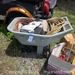 MaxSold Auction: Ames Easy Roller Garden Cart with Assorted Tools & Cords - Stevensville (Maryland, USA) PARTNER MANAGED Downsizing Online Auction - Old Love Point Road