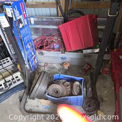 MaxSold Auction: Cast Iron Weight Plates & Aluminum Diamond Truck Toolbox, Cords & Tote - Stevensville (Maryland, USA) PARTNER MANAGED Downsizing Online Auction - Old Love Point Road