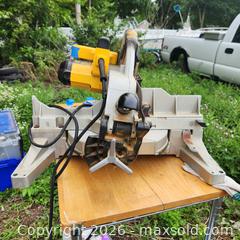 MaxSold Auction: DeWalt Sliding Compound Miter Saw, Corded Electric, 12 in Blade - Stevensville (Maryland, USA) PARTNER MANAGED Downsizing Online Auction - Old Love Point Road