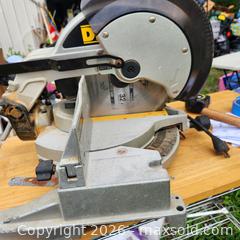 MaxSold Auction: DeWalt Sliding Compound Miter Saw, Corded Electric, 12 in Blade - Stevensville (Maryland, USA) PARTNER MANAGED Downsizing Online Auction - Old Love Point Road