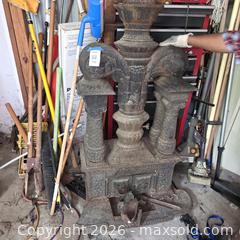 MaxSold Auction: Victorian Ornate Cast Iron Parlor Stove / Wood Burning, Large - Stevensville (Maryland, USA) PARTNER MANAGED Downsizing Online Auction - Old Love Point Road