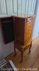 MaxSold Auction: Honey Light Oak Jewelry Armoire with Side Hooks & Lockable Doors - Pembroke (Ontario, Canada) PARTNER MANAGED Downsizing Online Auction - Ellis Avenue