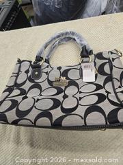 MaxSold Auction: Coach Canvas Tote Shoulder Bag with Leather Trim, Zip Top - Port Orchard (Washington, USA) SELLER MANAGED Downsizing Online Auction - May Ranch Lane South West
