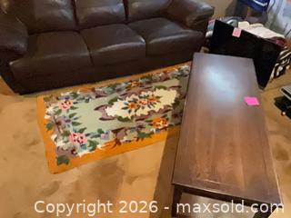 MaxSold Auction: Brown Leather 3-Seater Sofa, Solid Dark Wood Coffee Table & Rug - Thames Centre (Ontario, Canada) PARTNER MANAGED Estate Sale Online Auction - Wheeler Avenue