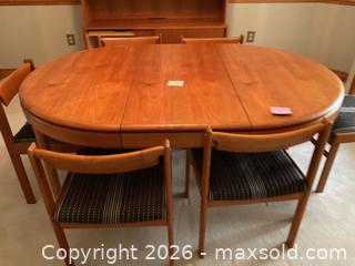 MaxSold Auction: Mid-Century Teak Oval Extendable Dining Table with 6 Chairs - Thames Centre (Ontario, Canada) PARTNER MANAGED Estate Sale Online Auction - Wheeler Avenue