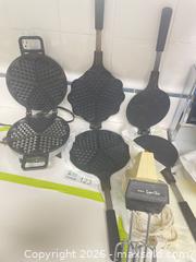 MaxSold Auction: Electric Waffle Maker, Cast Iron Stovetop Iron & Hand Mixer - New Westminster (British Columbia, Canada) PARTNER MANAGED Downsizing Online Auction - Laguna Court (CONDO)