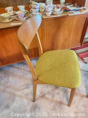 MaxSold Auction: Pair of Mid-Century Modern Teak Dining Chairs with Green Seats - New Westminster (British Columbia, Canada) PARTNER MANAGED Downsizing Online Auction - Laguna Court (CONDO)