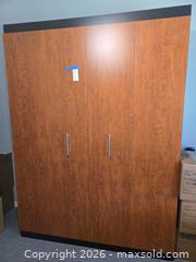 MaxSold Auction: Queen Murphy Wall Bed Cabinet, Cherry with Black Trim - Kissimmee (Florida, USA) PARTNER MANAGED Downsizing Online Auction - Vista Drive