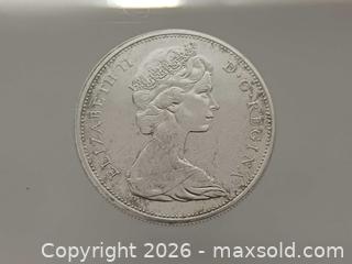 MaxSold Auction: 1965 Canada Silver Dollar  - Toronto (Ontario, Canada) PARTNER MANAGED Reseller Online Auction - Queen Street West