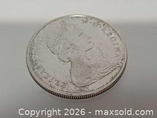 MaxSold Auction: 1965 Canada Silver Dollar  - Toronto (Ontario, Canada) PARTNER MANAGED Reseller Online Auction - Queen Street West