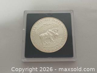 MaxSold Auction: 1985 Canada 50% Proof Silver Dollar 100th Anniversary of National Parks - Toronto (Ontario, Canada) PARTNER MANAGED Reseller Online Auction - Queen Street West