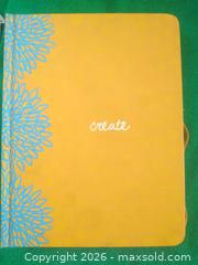 MaxSold Auction: Green Inspired A5 Hardcover Lined Notebook, Yellow Floral Trim - San Mateo (California, USA) SELLER MANAGED Moving Online Auction - Seville Way