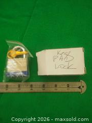MaxSold Auction: Small Brass-Body Keyed Padlock with Shackle, Keys & Box - San Mateo (California, USA) SELLER MANAGED Moving Online Auction - Seville Way