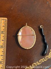 MaxSold Auction: 14k Gold Cameo Pendant + Black Coral Branch Pendant - Hamilton (Ontario, Canada) SELLER MANAGED Estate Sale Online Auction - Gertrude Street