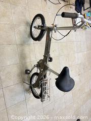 MaxSold Auction: 16-inch Folding Bike, Magnesium Alloy Frame, Silver/Gray - East Brunswick (New Jersey, USA) SELLER MANAGED Reseller Online Auction -  Tices Lane